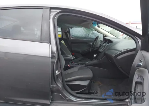 2012 Ford Focus Se z USA, uszkodzony, nr VIN 1FAHP3F21CL302608